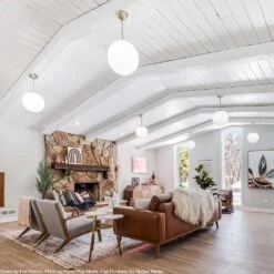 Cap Pendant 12" 14 Cap Pendant 12" -Cozy Light World cap globe pendant 12 brass white lighting by dutton brown space by fox homes photo by press play media 1