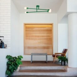 Color Captain Flush Mount 47" -Cozy Light World captain chandelier 47 kelly green lighting dutton brown photo by paul hanaoka unsplash