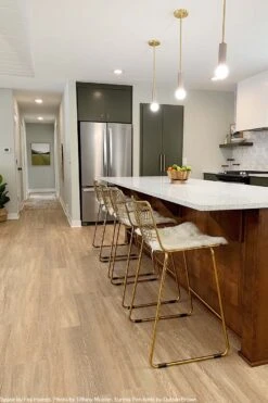 Color Eureka Pendant -Cozy Light World eureka pendant brass barely lighting by dutton brown space by fox homes photo by tiffany mueller