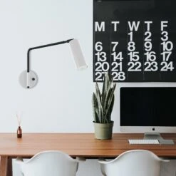 Color Reader Swing Arm Sconce - 17" Arm 23 Color Reader Swing Arm Sconce - 17" Arm -Cozy Light World reader swing arm sconce lighting by dutton brown desk scene photo by roman bozhko via unsplash 1