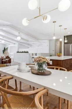 Status Chandelier 35" 10 Status Chandelier 35" -Cozy Light World status globe chandelier brass kitchen lighting by dutton brown space by fox homes photo by press play media 1