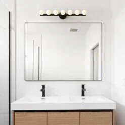 Color Vogue 7 Sconce -Cozy Light World vogue 7 sconce black black bathroom scene dutton brown 1